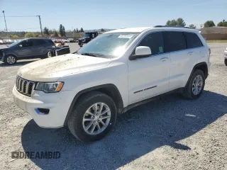 2021 Jeep Grand Cherokee Laredo E with VIN 1C4RJEAG9MC511725, listed as a Copart auction lot 50206655 with 117,348 mi miles and Salvage title. Bid and sale history available at DreamBid. Image 1.