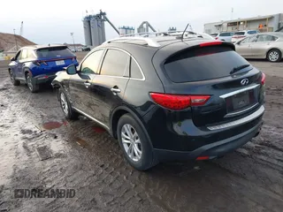 2015 Infiniti QX70 with VIN JN8CS1MW2FM480768, listed as a IAAI auction lot 41229824 with 149,146 mi miles and . Bid and sale history available at DreamBid. Image 3.