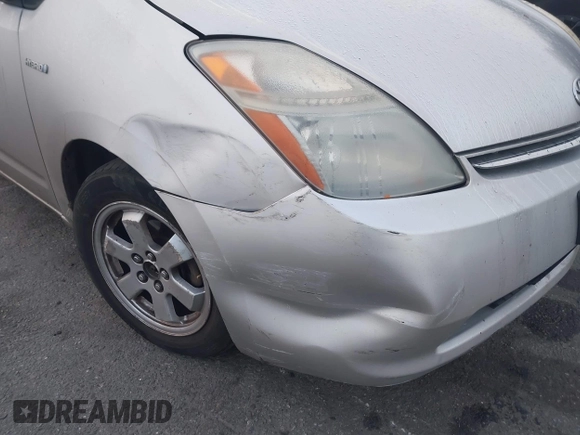2006 Toyota Prius with VIN JTDKB22U667523196, listed as a IAAI auction lot 41865639 with 282,399 mi miles. Bid and sale history available at carsss.com. Image 6.