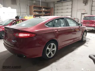 2015 Ford Fusion SE with VIN 3FA6P0H98FR283965, listed as a IAAI auction lot 41828009 with 122,217 mi miles. Bid and sale history available at carsss.com. Image 4.