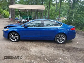 2017 Ford Fusion Hybrid SE with VIN 3FA6P0LU1HR162662, listed as a IAAI auction lot 42465793 with 116,414 mi miles and . Bid and sale history available at DreamBid. Image 14.