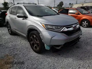 2018 Honda CR-V Touring with VIN 7FARW1H93JE055337, listed as a Copart auction lot 45045305 with 74,776 mi miles and Salvage Title. Bid and sale history available at DreamBid. Image 11.