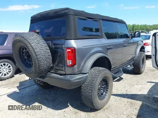 2022 Ford Bronco with VIN 1FMDE5BH9NLB87372, listed as a IAAI auction lot 42178135 with 71,585 mi miles and . Bid and sale history available at DreamBid. Image 4.