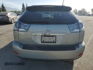 2006 Lexus RX 400h z VIN JTJHW31U760043860, wystawiony jako Copart lot #58057015 z przebiegiem 97 618 mil mil oraz Szkoda całkowita • Salvage title. Historia ofert i sprzedaży dostępna na DreamBid. Obrazek 6.