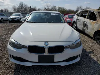 2013 BMW 3 Series 320i xDrive with VIN WBA3C3C5XDF980169, listed as a Copart auction lot 52717675 with 119,297 mi miles and Salvage title. Bid and sale history available at DreamBid. Image 5.