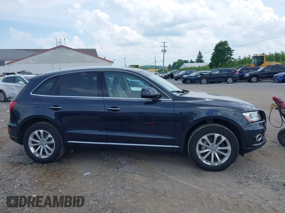 2016 Audi Q5 Premium Plus z VIN WA1L2AFP3GA035874, wystawiony jako IAAI lot #42618317 z przebiegiem 40 980 mil mil oraz . Historia ofert i sprzedaży dostępna na DreamBid. Obrazek 13.