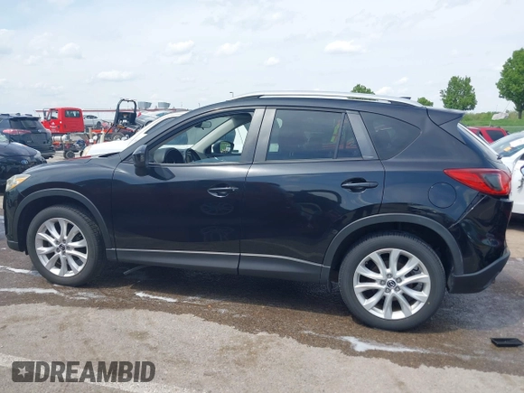 2013 Mazda CX-5 Grand Touring with VIN JM3KE4DE6D0148030, listed as a IAAI auction lot 42082947 with 119,432 mi miles and . Bid and sale history available at DreamBid. Image 14.