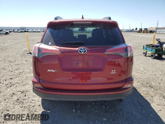 2018 Toyota RAV4 LE with VIN 2T3BFREV9JW852635, listed as a Copart auction lot 59807005 with 60,519 mi miles and Salvage title. Bid and sale history available at DreamBid. Image 6.
