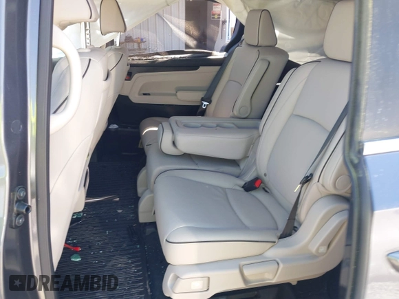 2025 Honda Odyssey Touring z VIN 5FNRL6H84SB028769, wystawiony jako IAAI lot #41856080 z przebiegiem Nie podano mil oraz . Historia ofert i sprzedaży dostępna na DreamBid. Obrazek 8.