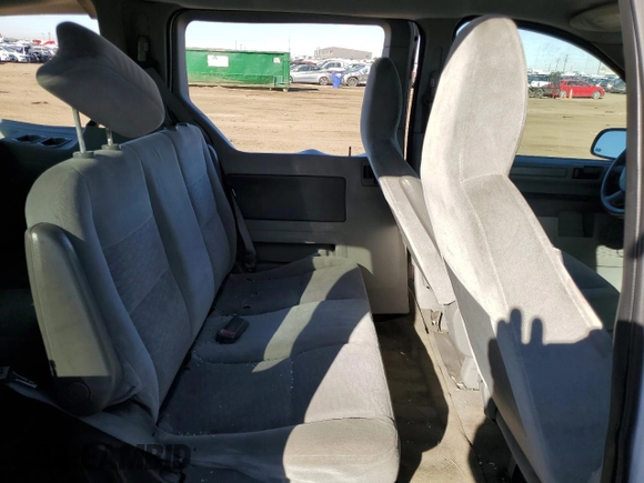 2007 Ford Freestar Cargo z VIN 2FTZA54677BA14812, wystawiony jako Copart lot #78543704 z przebiegiem 258 216 mil mil oraz Szkody całkowita. Historia ofert i sprzedaży dostępna na DreamBid. Obrazek 11.