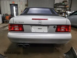 1999 Mercedes-Benz SL-Class with VIN WDBFA68F0XF180251, listed as a Copart auction lot 81543864 with 136,234 mi miles and Salvage Title. Bid and sale history available at carsss.com. Image 6.