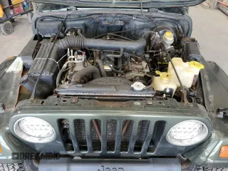 1998 Jeep Wrangler Sahara z VIN 1J4FY49S4WP728476, wystawiony jako Copart lot #53490515 z przebiegiem 272 058 mil mil oraz Czysty tytuł • Clean title. Historia ofert i sprzedaży dostępna na DreamBid. Obrazek 11.
