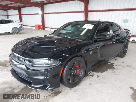 2019 Dodge Charger SRT Hellcat with VIN 2C3CDXL97KH552439, listed as a IAAI auction lot 41813879 with 58,921 mi miles and . Bid and sale history available at DreamBid. Image 17.