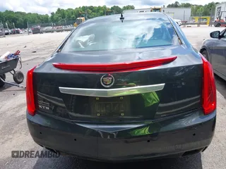 2013 Cadillac XTS Luxury z VIN 2G61P5S34D9109189, wystawiony jako IAAI lot #42242533 z przebiegiem 178 234 mil mil oraz . Historia ofert i sprzedaży dostępna na DreamBid. Obrazek 16.