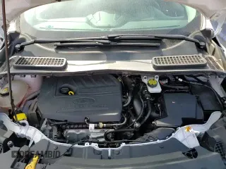 2018 Ford Escape SE с VIN 1FMCU9GD1JUB06459, выставлен на аукционе Copart как лот 84913405 с пробегом 101 457 миль миль и Чистый • Clean title. История ставок и продаж доступна на DreamBid. Изображение 14.