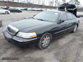 2011 Lincoln Town Car Executive L w/Livery Pkg with VIN 2LNBL8EV2BX756979, listed as a IAAI auction lot 41927794 with NaN miles. Bid and sale history available at carsss.com. Image 2.