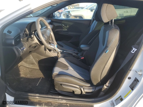 2019 Hyundai Veloster 2.0 with VIN KMHTG6AF6KU019982, listed as a Copart auction lot 88219405 with 56,849 mi miles and Salvage Title. Bid and sale history available at carsss.com. Image 7.