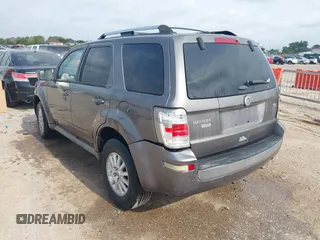 2011 Mercury Mariner Premier with VIN 4M2CN8HG3BKJ07656, listed as a IAAI auction lot 42369474 with 250,352 mi miles and . Bid and sale history available at DreamBid. Image 3.