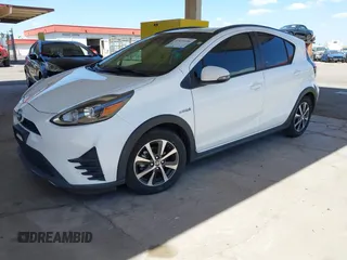 2018 Toyota Prius One with VIN JTDKDTB32J1600004, listed as a IAAI auction lot 42030186 with 61,568 mi miles and . Bid and sale history available at DreamBid. Image 2.