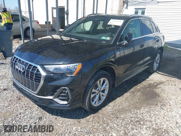 2021 Audi Q3 S line Premium with VIN WA1DECF36M1031852, listed as a IAAI auction lot 42020471 with 29,445 mi miles and . Bid and sale history available at DreamBid. Image 2.