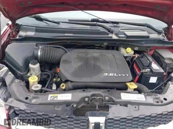 2015 Dodge Grand Caravan SXT with VIN 2C4RDGCG3FR566522, listed as a IAAI auction lot 41861262 with 169,443 mi miles and . Bid and sale history available at DreamBid. Image 10.