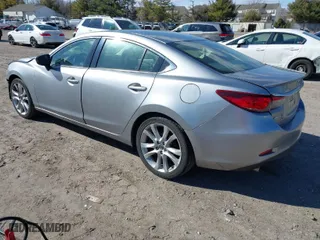 2014 Mazda Mazda6 i Touring with VIN JM1GJ1V61E1158895, listed as a IAAI auction lot 41705530 with NaN miles. Bid and sale history available at carsss.com. Image 3.