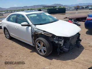 2014 Volkswagen Passat SEL Premium z VIN 1VWCN7A37EC077905, wystawiony jako IAAI lot #42421674 z przebiegiem 83 889 mil mil oraz . Historia ofert i sprzedaży dostępna na DreamBid. Obrazek 1.