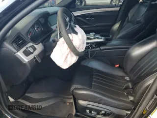 2014 BMW M5 z VIN WBSFV9C53ED594132, wystawiony jako Copart lot #67114384 z przebiegiem 89 020 mil mil oraz Szkoda całkowita • Salvage title. Historia ofert i sprzedaży dostępna na DreamBid. Obrazek 7.