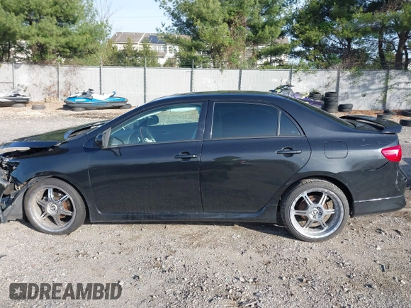 2009 Toyota Corolla with VIN 2T1BU40E29C084079, listed as a IAAI auction lot 41932383 with 172,784 mi miles. Bid and sale history available at carsss.com. Image 14.