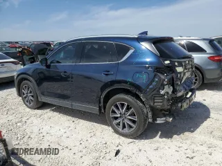 2018 Mazda CX-5 Grand Touring with VIN JM3KFBDM8J0474819, listed as a Copart auction lot 48580545 with 76,917 mi miles and Salvage Title. Bid and sale history available at DreamBid. Image 2.