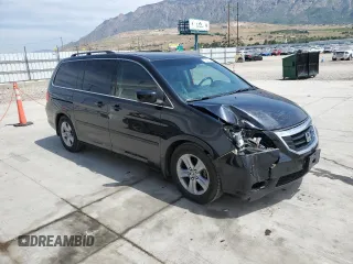 2008 Honda Odyssey Touring with VIN 5FNRL38908B092436, listed as a Copart auction lot 59914655 with 186,462 mi miles and Salvage title. Bid and sale history available at DreamBid. Image 4.