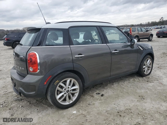 2014 MINI Cooper Countryman S with VIN WMWZC3C53EWT00673, listed as a Copart auction lot 44454065 with 76,561 mi miles and Salvage Title. Bid and sale history available at carsss.com. Image 3.