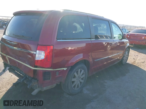2013 Chrysler Town & Country Touring with VIN 2C4RC1BG2DR758951, listed as a IAAI auction lot 41136184 with 134,784 mi miles. Bid and sale history available at carsss.com. Image 4.