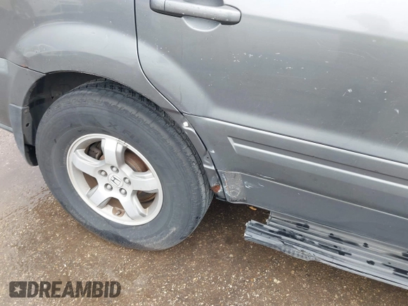 2008 Honda Pilot EX-L with VIN 5FNYF28548B007852, listed as a IAAI auction lot 42387060 with 261,023 mi miles and . Bid and sale history available at DreamBid. Image 12.