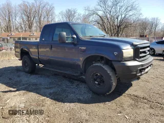 2004 Ford F-350 XL with VIN 1FTSX31S14ED20457, listed as a Copart auction lot 48212875 with 310,057 mi miles and Clean Title. Bid and sale history available at DreamBid. Image 4.