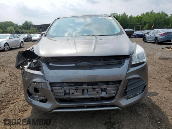 2014 Ford Escape SE с VIN 1FMCU9GX9EUD73493, выставлен на аукционе Copart как лот 60605385 с пробегом 123 236 миль миль и Списание • Salvage title. История ставок и продаж доступна на DreamBid. Изображение 5.