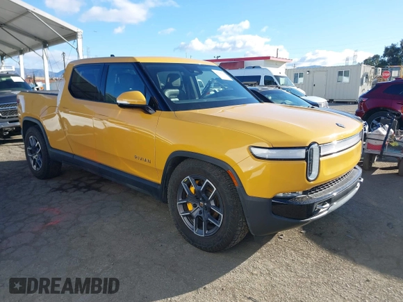 2022 Rivian R1T Adventure Package with VIN 7FCTGAAA2NN005811, listed as a IAAI auction lot 41706558 with 21,336 mi miles. Bid and sale history available at carsss.com. Image 1.