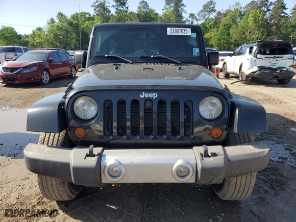 2013 Jeep Wrangler Unlimited Sahara with VIN 1C4HJWEG5DL585896, listed as a Copart auction lot 52007635 with 101,465 mi miles and Salvage Title. Bid and sale history available at carsss.com. Image 5.
