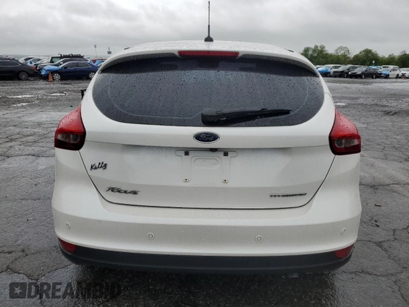 2017 Ford Focus Titanium с VIN 1FADP3N23HL244301, выставлен на аукционе Copart как лот 56625555 с пробегом 96 304 миль миль и Списание • Salvage title. История ставок и продаж доступна на DreamBid. Изображение 6.