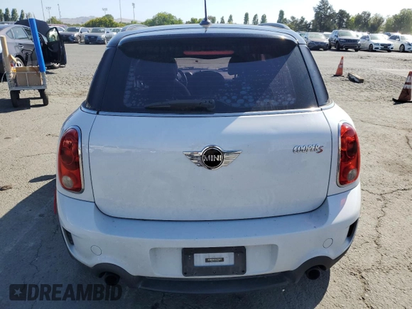 2014 MINI Countryman S with VIN WMWZC3C5XEWP25792, listed as a Copart auction lot 58583455 with 83,831 mi miles and Salvage title. Bid and sale history available at DreamBid. Image 6.