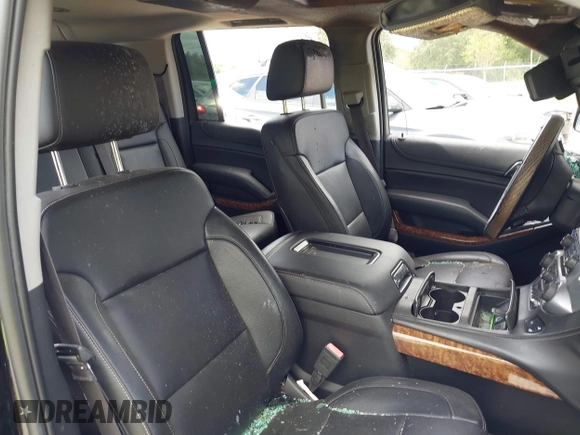2015 Chevrolet Suburban LTZ with VIN 1GNSCKKC8FR156706, listed as a IAAI auction lot 40638221 with Not Provided miles and . Bid and sale history available at DreamBid. Image 5.