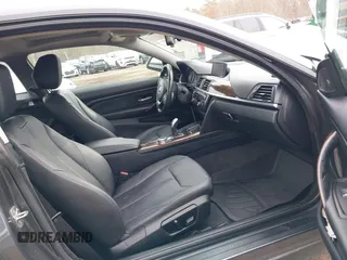2014 BMW 4 Series 428i xDrive with VIN WBA3N9C50EK246002, listed as a IAAI auction lot 41612256 with 100,915 mi miles and . Bid and sale history available at carsss.com. Image 5.