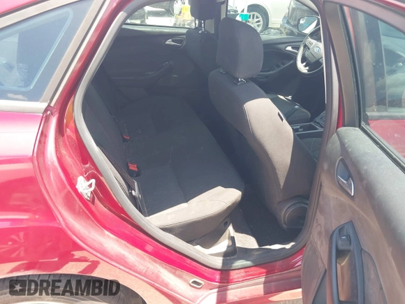 2016 Ford Focus SE z VIN 1FADP3F28GL237888, wystawiony jako IAAI lot #42564140 z przebiegiem 143 210 mil mil oraz . Historia ofert i sprzedaży dostępna na DreamBid. Obrazek 8.