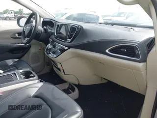 2023 Chrysler Pacifica Hybrid Touring L with VIN 2C4RC1L75PR611901, listed as a IAAI auction lot 42626500 with 44,156 mi miles and . Bid and sale history available at DreamBid. Image 5.