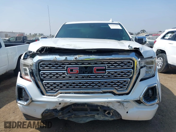 2021 GMC Sierra 1500 Denali z VIN 3GTU9FEL1MG349215, wystawiony jako IAAI lot #42585810 z przebiegiem 97 465 mil mil oraz . Historia ofert i sprzedaży dostępna na DreamBid. Obrazek 12.
