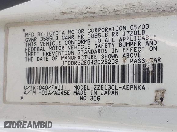 2004 Toyota Corolla CE with VIN JTDBR32E042025208, listed as a IAAI auction lot 41934485 with 299,999 mi miles. Bid and sale history available at carsss.com. Image 9.