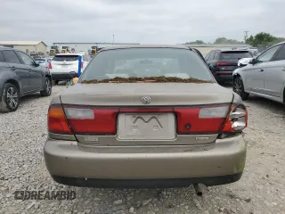 1997 Mazda Protege DX z VIN JM1BC1414V0103244, wystawiony jako Copart lot #56219745 z przebiegiem Nie podano mil oraz Szkoda całkowita • Salvage title. Historia ofert i sprzedaży dostępna na DreamBid. Obrazek 6.