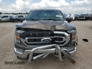 2021 Ford F-150 XL with VIN 1FTEW1CP7MFB36177, listed as a Copart auction lot 51148675 with 64,640 mi miles and Salvage Title. Bid and sale history available at carsss.com. Image 5.