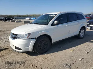 2015 Dodge Journey SE z VIN 3C4PDCAB5FT537754, wystawiony jako Copart lot #52217555 z przebiegiem 128 239 mil mil oraz Czysty tytuł • Clean title. Historia ofert i sprzedaży dostępna na DreamBid. Obrazek 1.