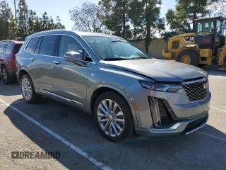 2023 Cadillac XT6 FWD Premium Luxury z VIN 1GYKPCRS5PZ212337, wystawiony jako Copart lot #46283655 z przebiegiem 15 660 mil mil oraz Szkody całkowita. Historia ofert i sprzedaży dostępna na DreamBid. Obrazek 4.